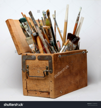 stock-photo-old-wooden-box-with-paint-brushes-isolated-on-white-152880002.jpg